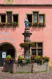 Flower-Bedecked Fountain in front of the Guard House, Turckheim, Alsace, France
