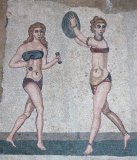 Mosaic floor in Villa Romana del Casale - detail of the bikini girls mosaic